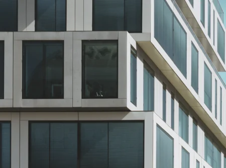 Corner Windows grey concrete building with big
