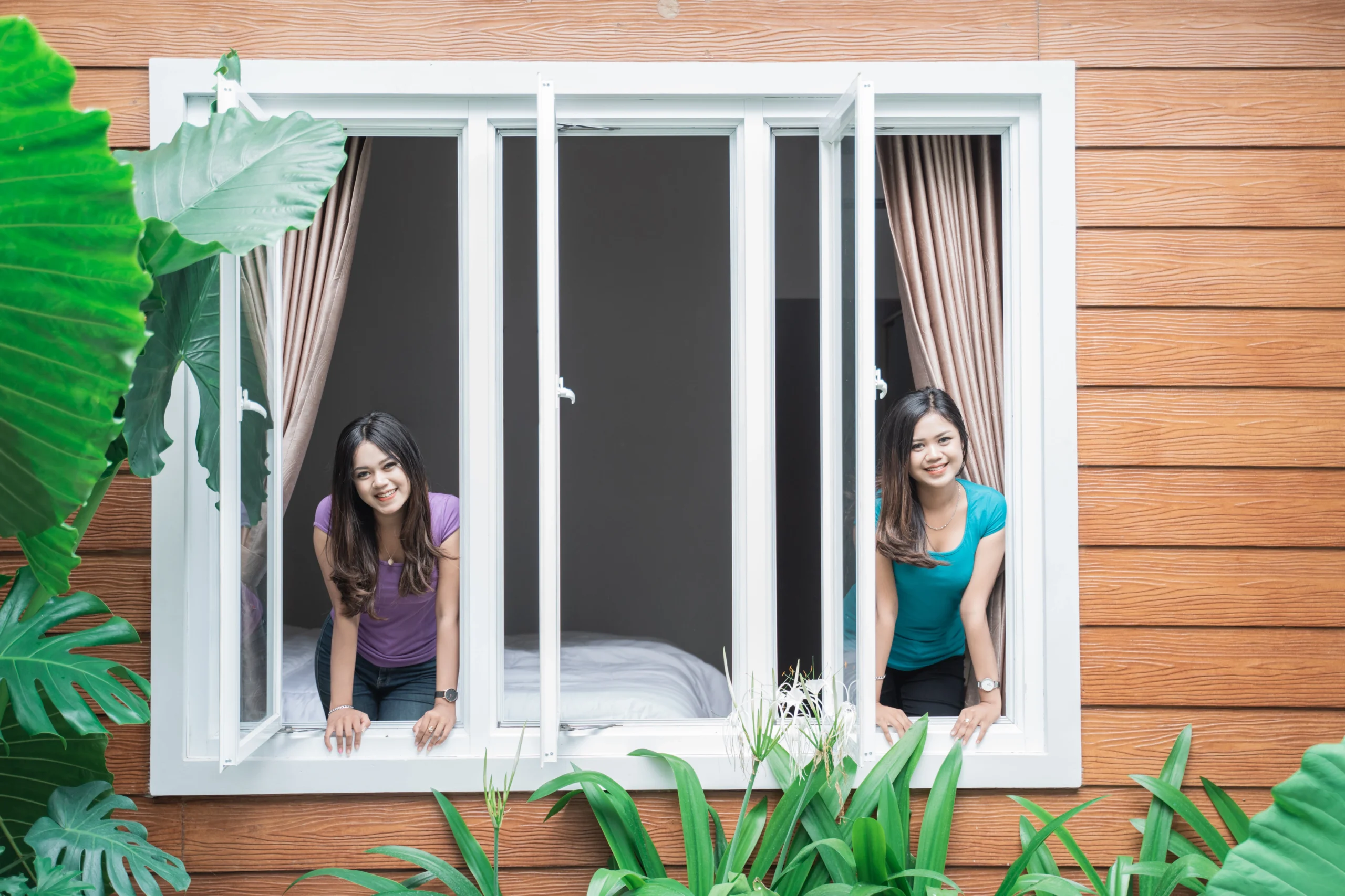 About Us portrait two beautiful twin sist